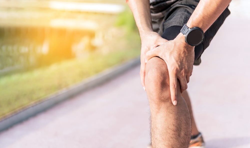 injury,from,workout,concept,:,the,man,use,hands,hold