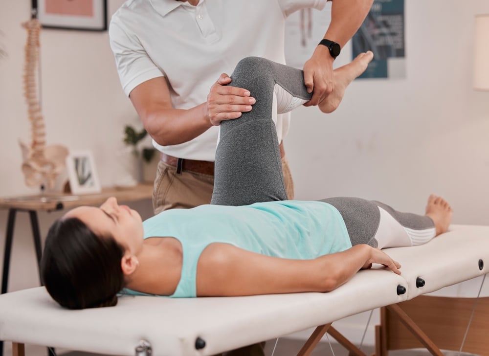 leg,,physiotherapy,and,healthcare,of,woman,at,hospital,for,rehabilitation,